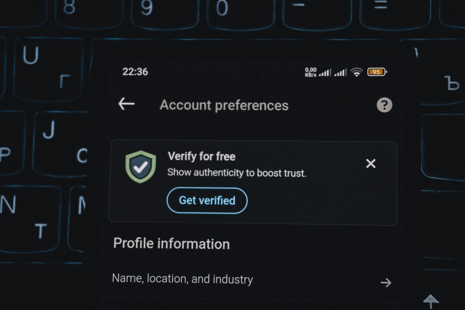 Account security settings screen showing a user verification prompt on a digital platform interface